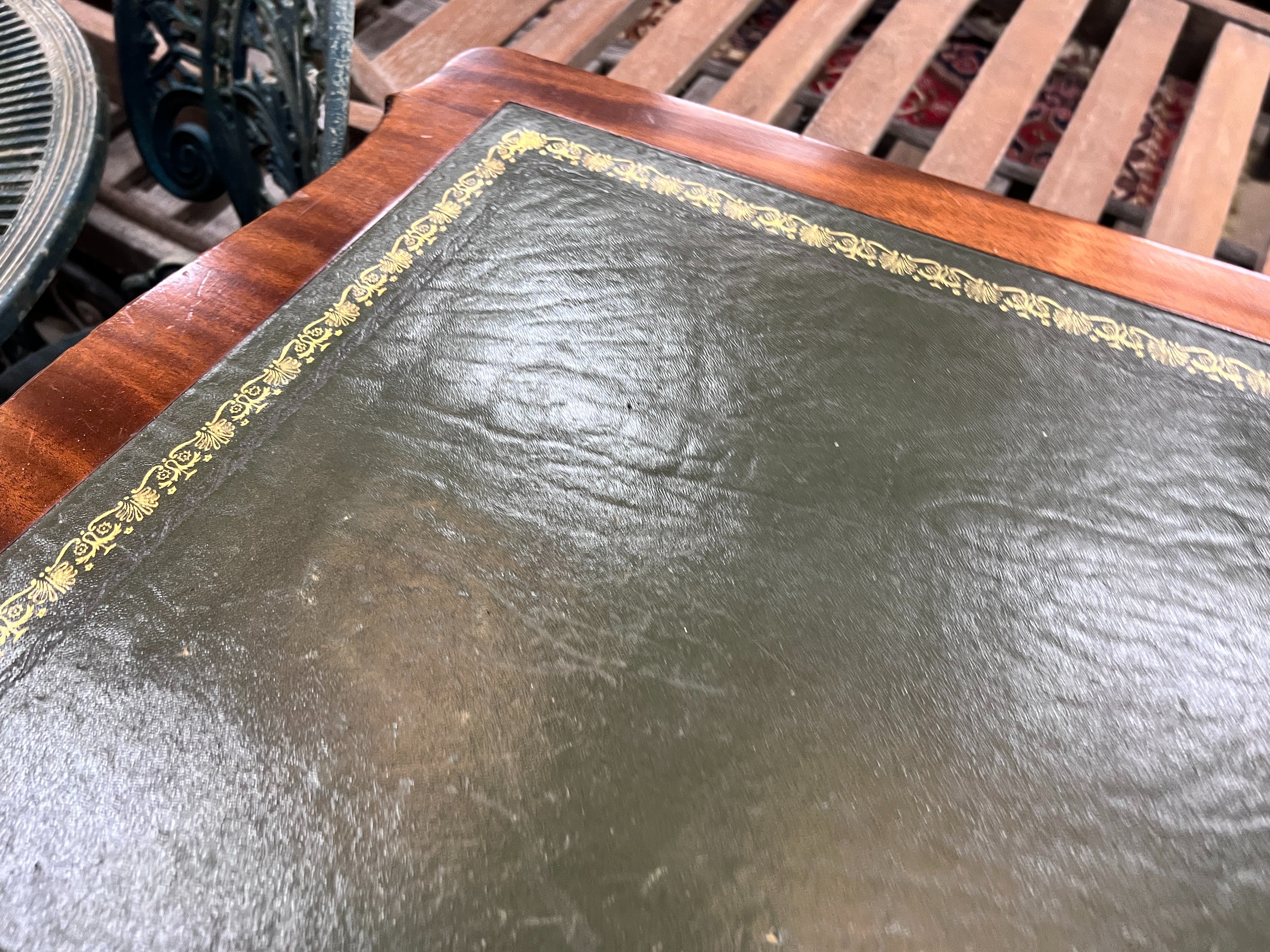 A reproduction George III style mahogany kneehole writing table, width 120cm, depth 58cm, height 76cm *Please note the sale commences at 9am.